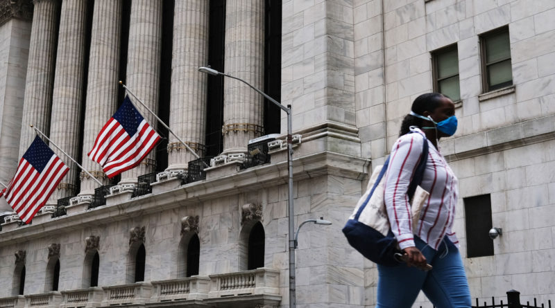 Stock futures fall slightly, continuing volatile week on Wall Street