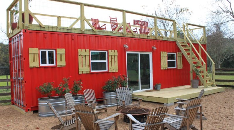 This company converted a shipping container into a mobile tiny ‘rustic farmhouse’ with rooftop deck — see inside